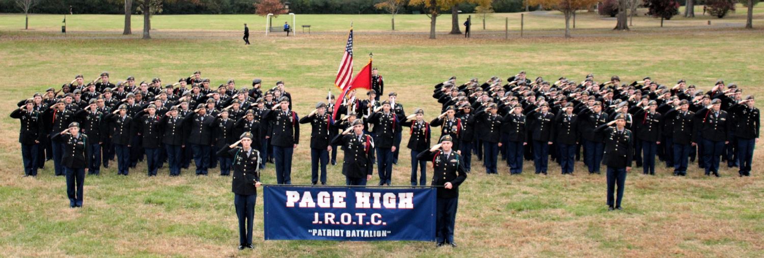 The Page High JROTC lined up in uniform saluting.